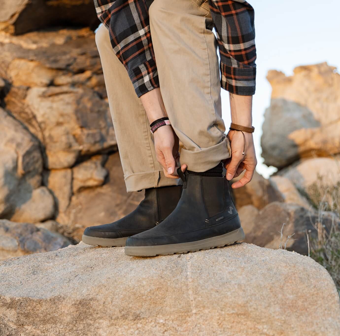 Click to shop Forsake Women's styles. Image features the Lucie Mid in black/olive.