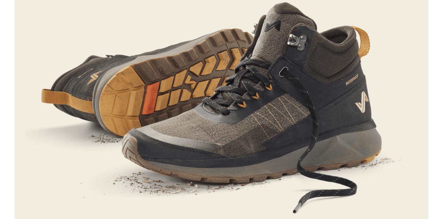 The Forsake Men's Cascade Peak Mid in brown shown as worn shoes.
