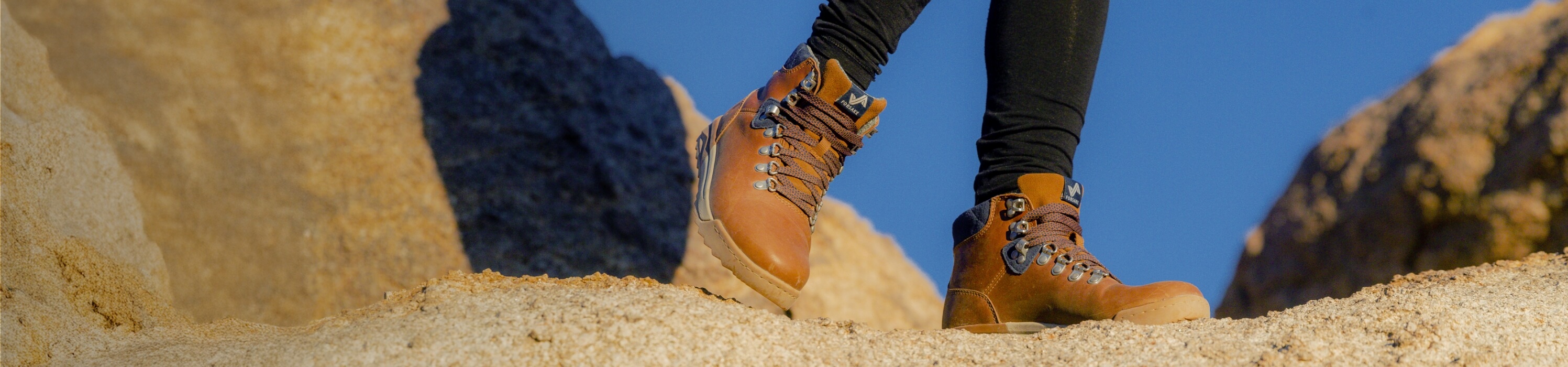 Shop our end of season sale featuring the Patch in tan on a rock.