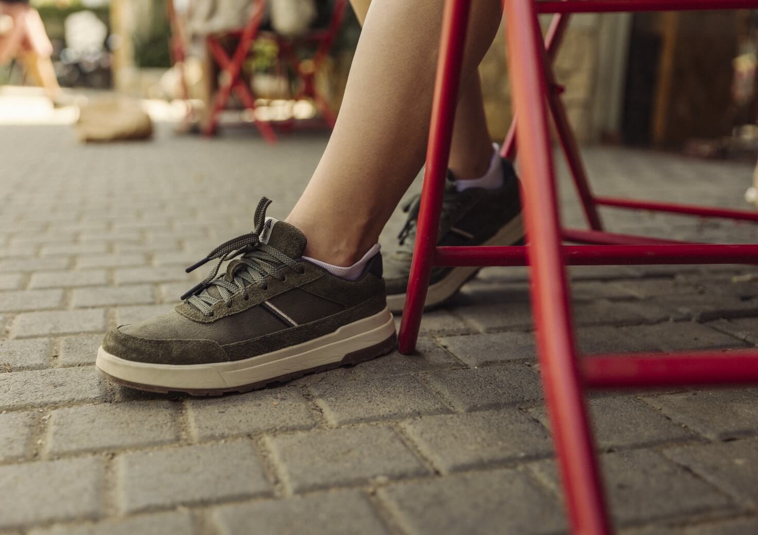 Image features the Mae Low in olive.