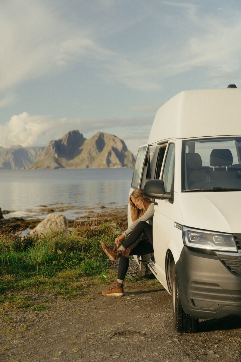 The featured image shows three people sitting in/on an orange van in a desert surrounded by rocks and wearing Forsake shoes.