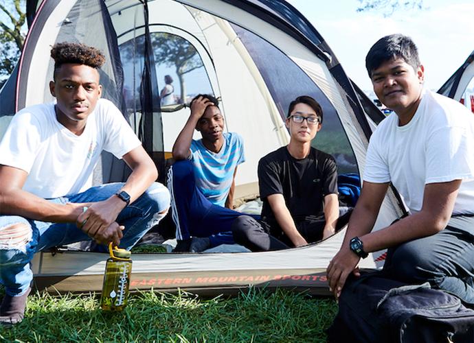 The featured image shows kids camping. 