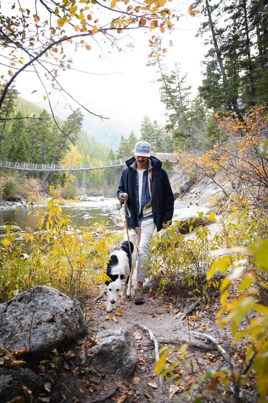 The featured image shows a person wearing Forsake shoes while walking a dog on a hiking path.
