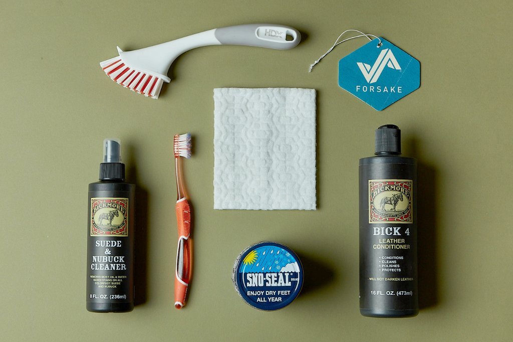 The image features a few shoe cleaners and tools to keep your Forsake's as clean as possible. 