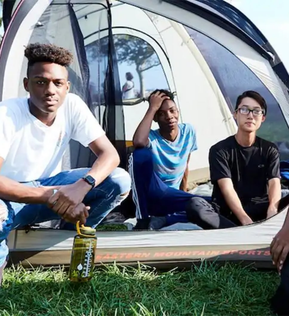 The featured image shows kids camping. 